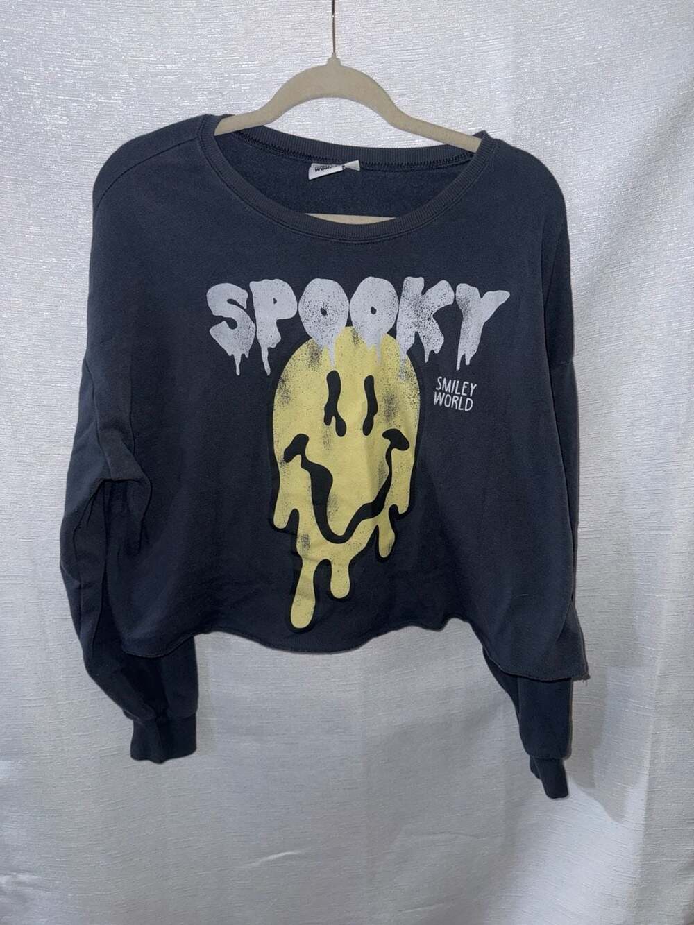 SmileyWorld Spooky Melted Face Cropped Halloween Sweatshirt